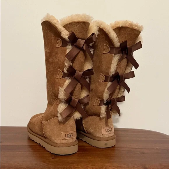 UGG Women's Tan Sheepskin Bow Boots - Picture 1 of 6